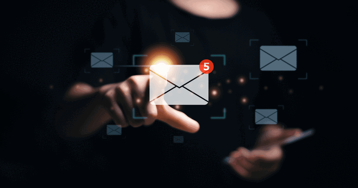 Finger touching a glowing email icon with a red notification badge among floating envelope icons